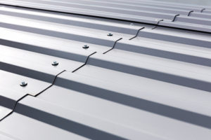 Affordable Roofing offers Corrugated Metal Panel in Gray Coating