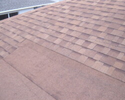 Affordable Roofing offers flat asphalt granule roofing material